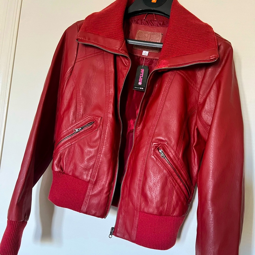 Red 100% polyurethane lining 100% polyester exterior : Size Large jacket NWT